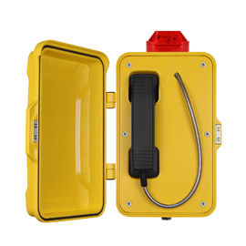 El teléfono análogo industrial amarillo/impermeabiliza el teléfono análogo con la lámpara amonestadora